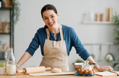 woman in bakery cooking with cannabis.